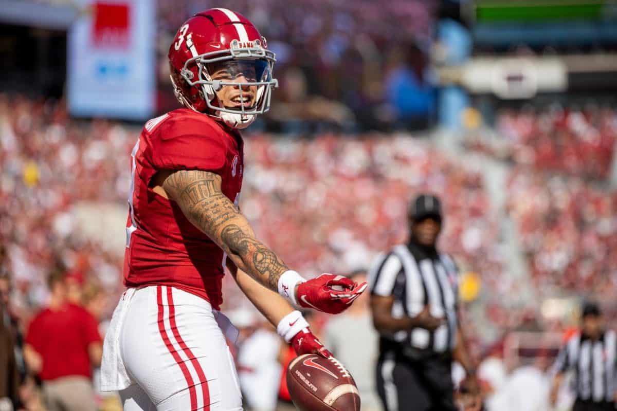 Alabama wide receiver Jermaine Burton (#3) following a catch that would be ruled short of a touchdown.