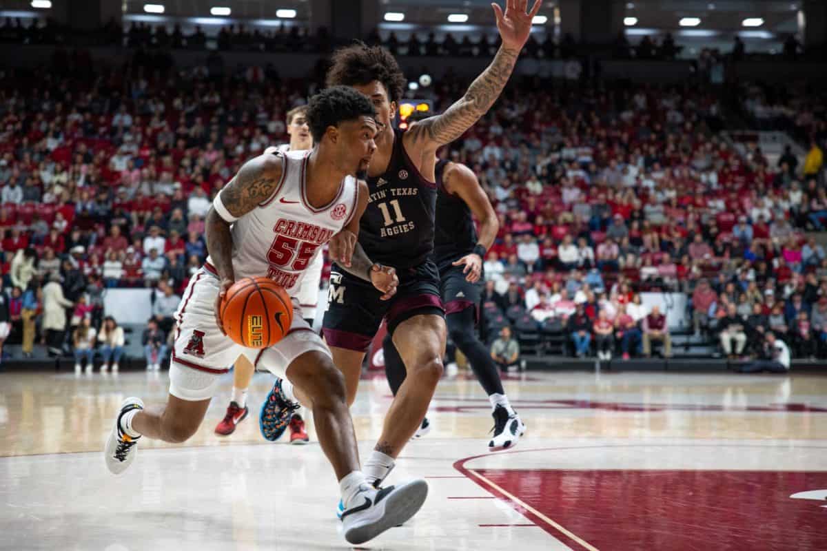 Alabama guard Aaron Estrada (#55) pushes toward the goal against Texas A&M.