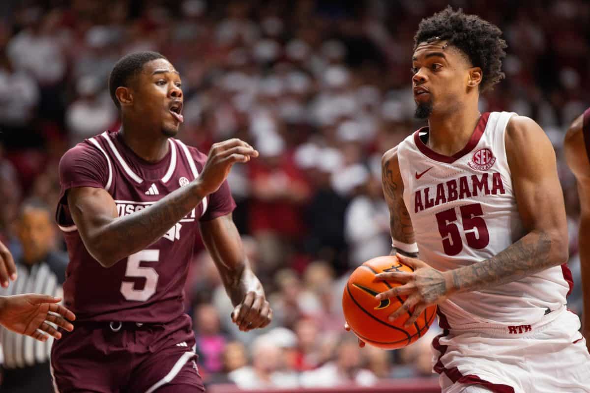 Alabama guard Aaron Estrada (#55) pushes toward the goal against Mississippi State.