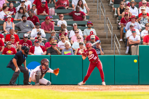 Alabama catcher Marlie Giles eyes an incoming pitch versus Virginia Tech in the final game of the Tuscaloosa Regional in the 2025 NCAA softball tournament at Rhodes Stadium on May 18, 2025. 