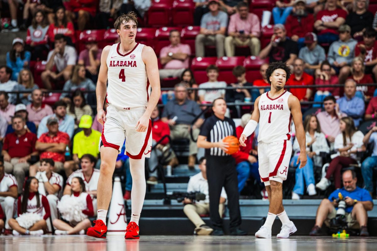 Forward Grant Nelson (#4) and guard Mark Sears (#1) play in Alabama's game against McNeese on Nov. 11, 2024, in Tuscaloosa, AL.